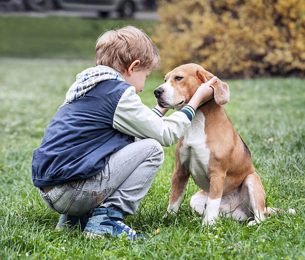 istock Two best friends - boy and his dog 473571742
