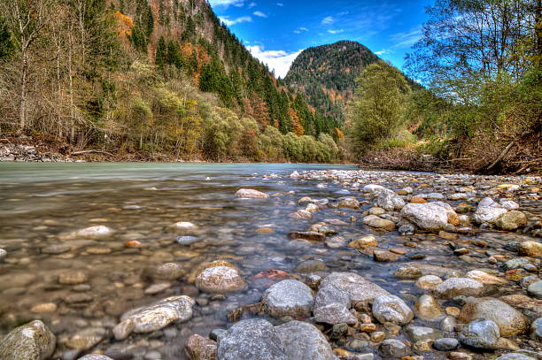 istock Rocks in the flowing river at the mountains 473573778