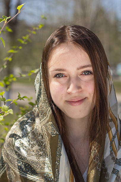 istock Beautiful girl in a headscarf 473573914
