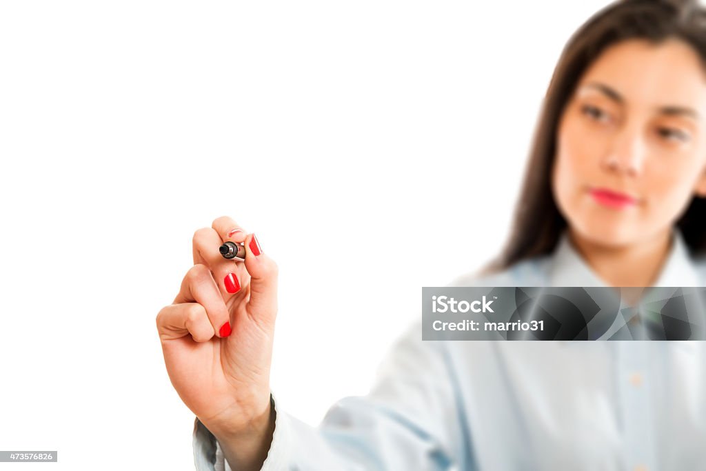 young businesswoman drawing on whiteboard 2015 Stock Photo