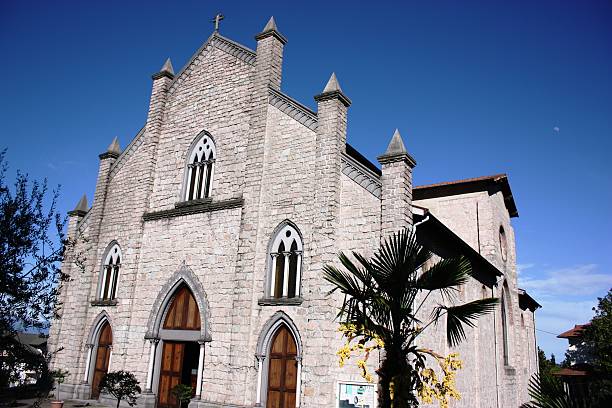istock Church Stresa Parish Carciano Dwelling under blue sky 473577310