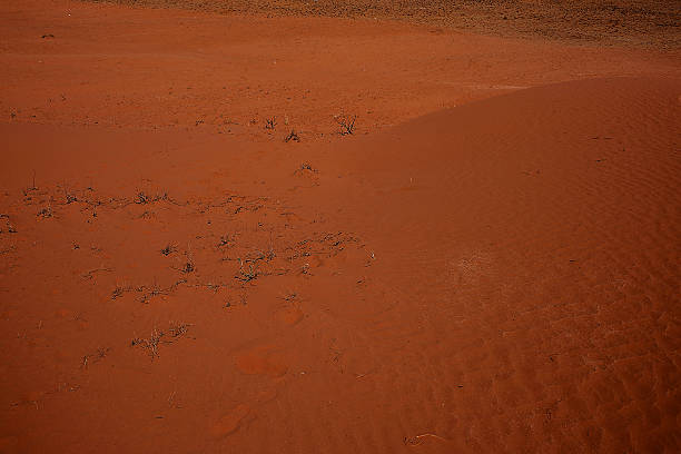 istock The texture of the red sand 473578782