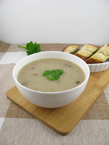 Porcini mushroom cream soup and lye baguette with herb butter