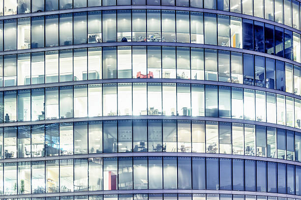 istock Illuminated office buildings in London 473583586