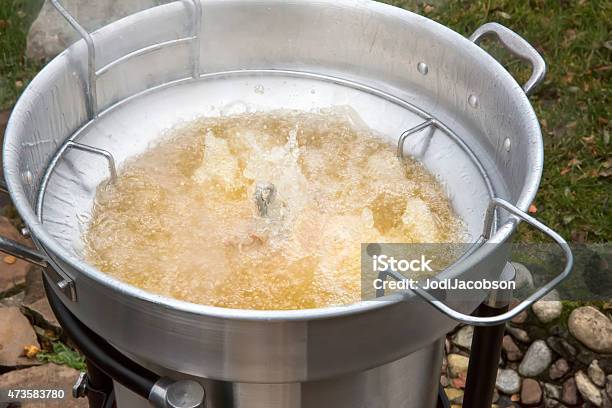 Thanksgiving Turkey Being Cooked In An Outdoor Deep Fryer Stock Photo - Download Image Now