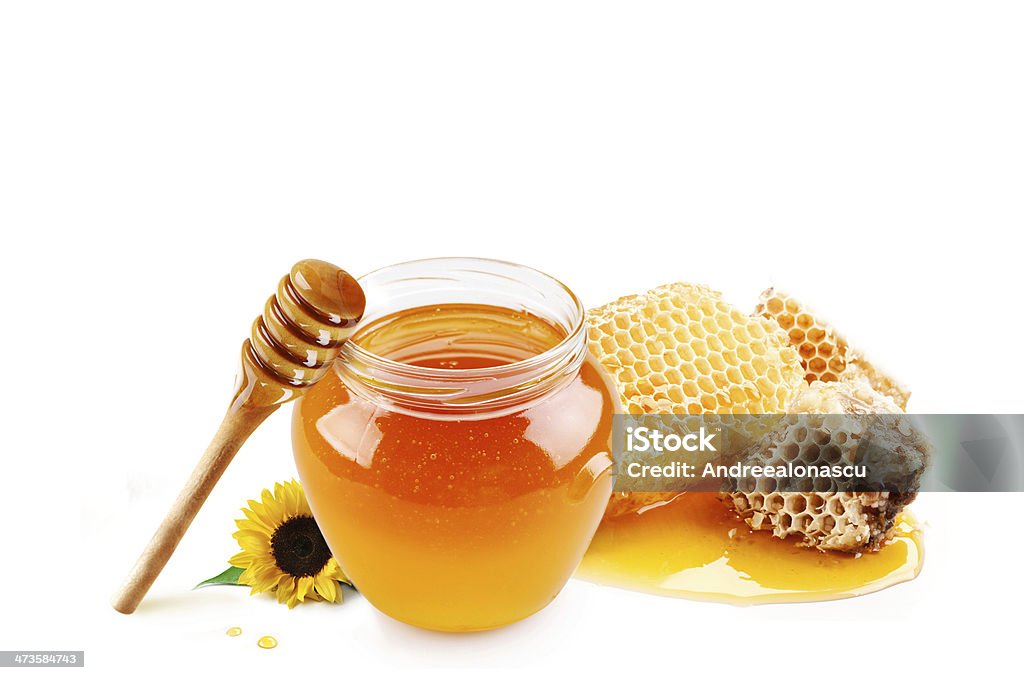 Honey in glass jar and honeycombs wax Agriculture Stock Photo