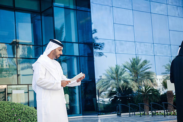 istock Arabian Businessman Reading Contract 473586714