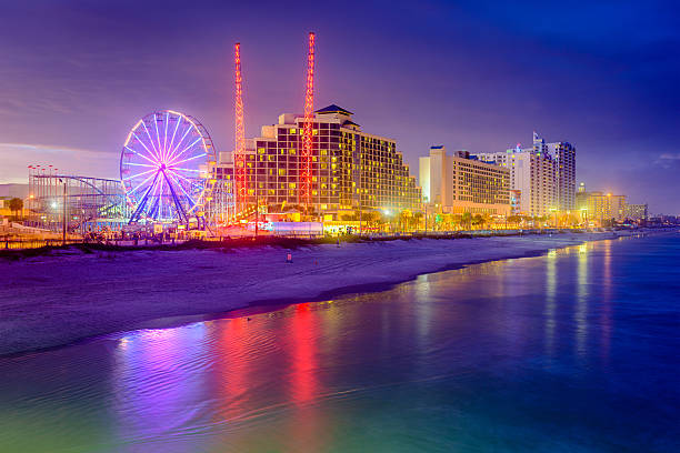 istock Boardwalk at night on Daytona Beach, Florida 473593302
