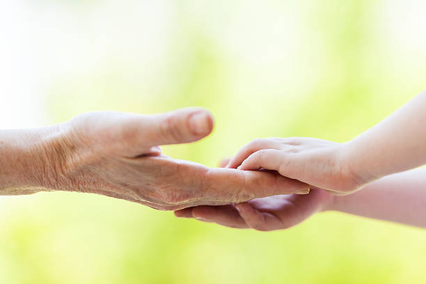 istock Child and Mother Hands 473594002