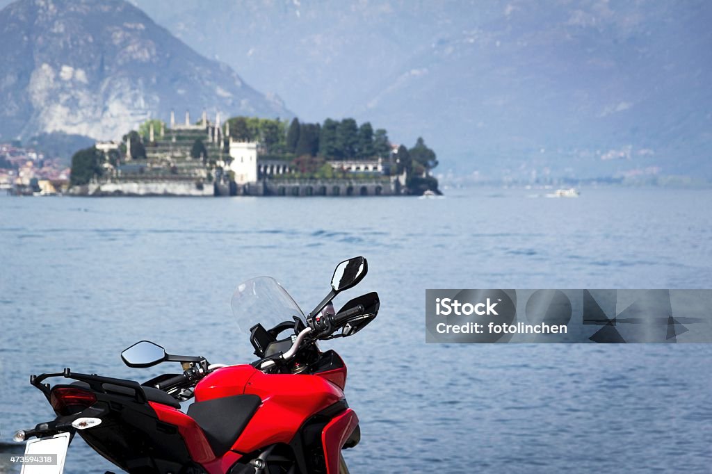 lake maggiore A view over the Lake Lago Maggiore to the island Isola Bella. Motorcycle Stock Photo