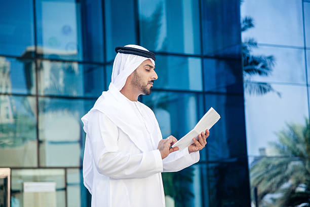 istock Arabian Businessman Reading Contract 473602472