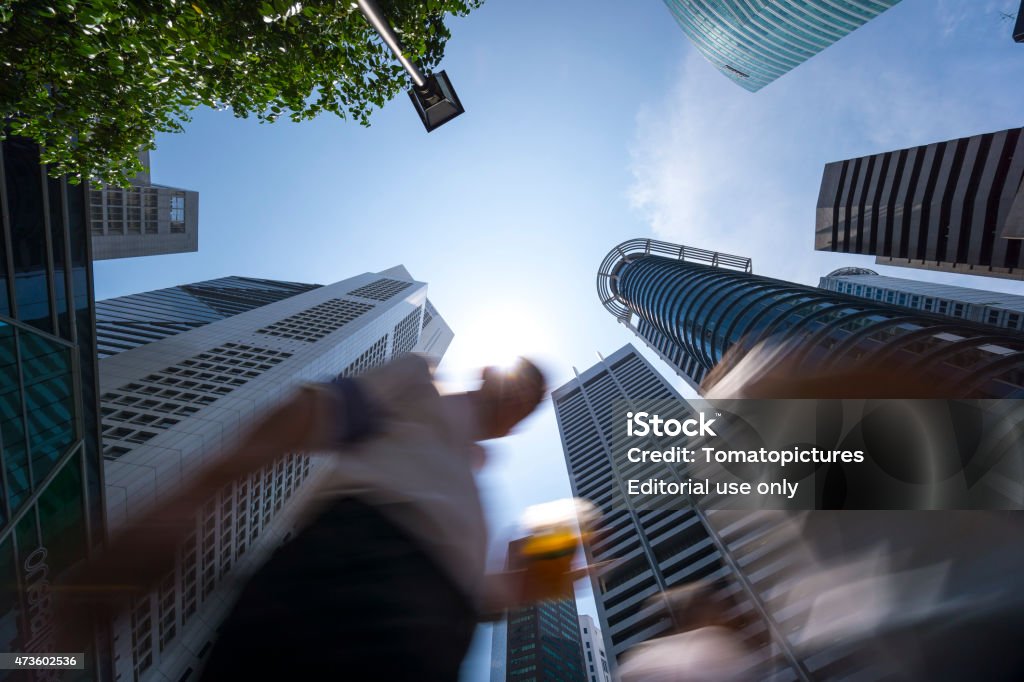 Singapore Central Business District Singapore, Singapore - May 12, 2015: Singapore Central Business District at Raffles Place taken at low angle. 2015 Stock Photo