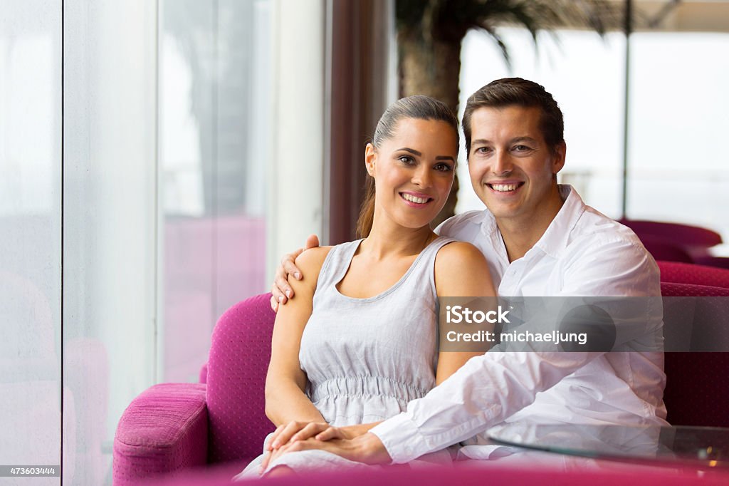 couple sitting in cafe lovely young couple sitting in cafe 2015 Stock Photo