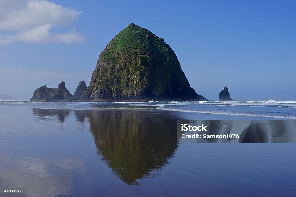 Haystack Rock Reflection Northern Oregon's Epic Coastline. 2015 Stock Photo