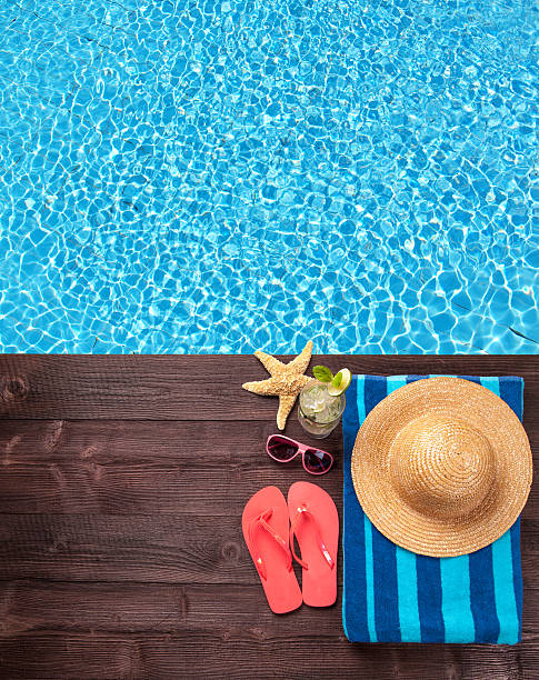 istock Swimming accessories on wooden mole 473611660