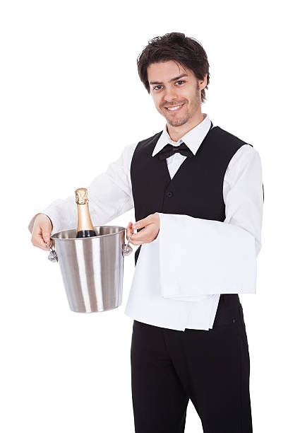 retrato de un mayordomo con botella de champán - waiter butler champagne tray fotografías e imágenes de stock