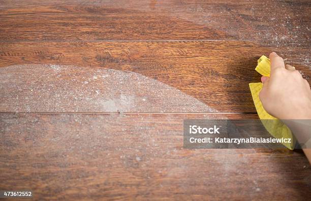 Wiping Dusty Wood Using Rag Stock Photo - Download Image Now - Dust, Dusting, Cleaning