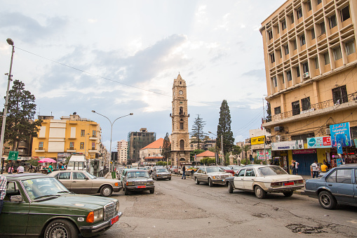 Tripoli, Lebanon - May 14, 2015: Taxi drivers waiting at the Al-Tell Clock Tower in Tripoli Lebanon.