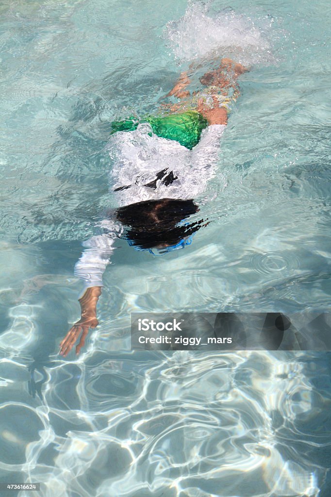 Japanese boy swimming in the pool (5 years old) 2015 Stock Photo