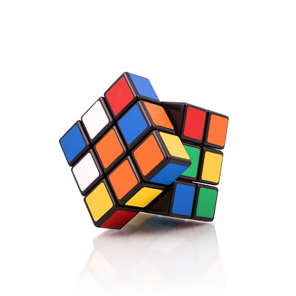 Kragujevac, Serbia - April 9, 2015: Rubik's Cube on a white background. Rubik's Cube invented by a Hungarian architect Ernő Rubik in 1974.