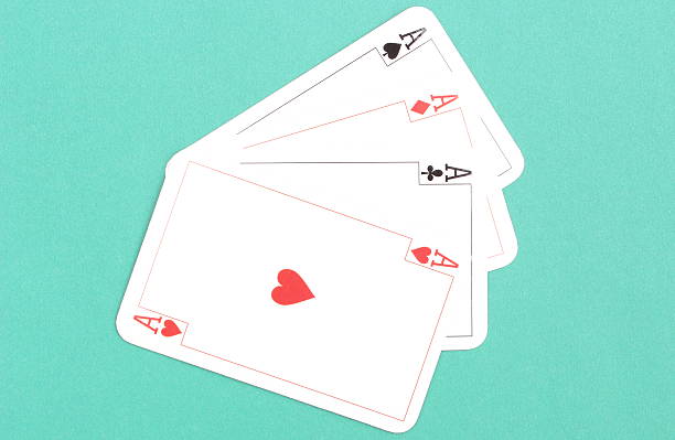 istock Composition of four aces on green background 473627354