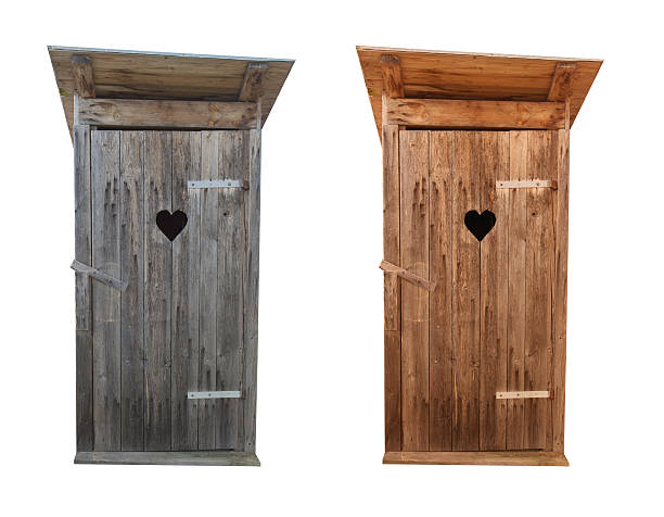 Wooden toilets isolated on white