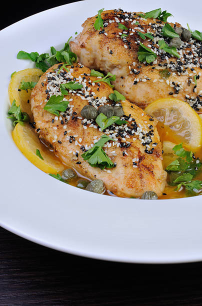 istock Chicken fillet in lemon-wine gravy 473627490