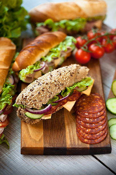 tasty sandwiches on a wooden table
