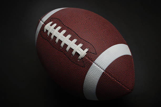 istock Football on a black background 473636842