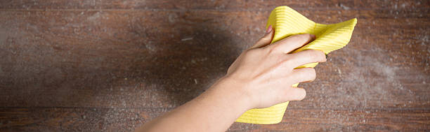 istock Close-up of woman dusting parquet 473637768
