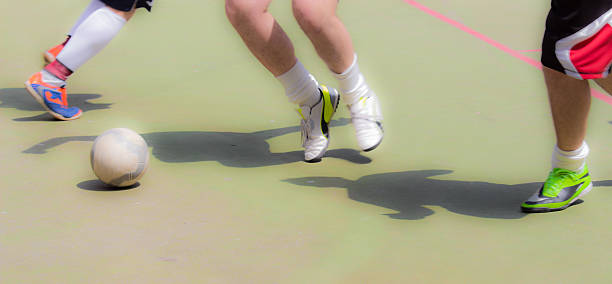 istock Boys  are playing football 473654082