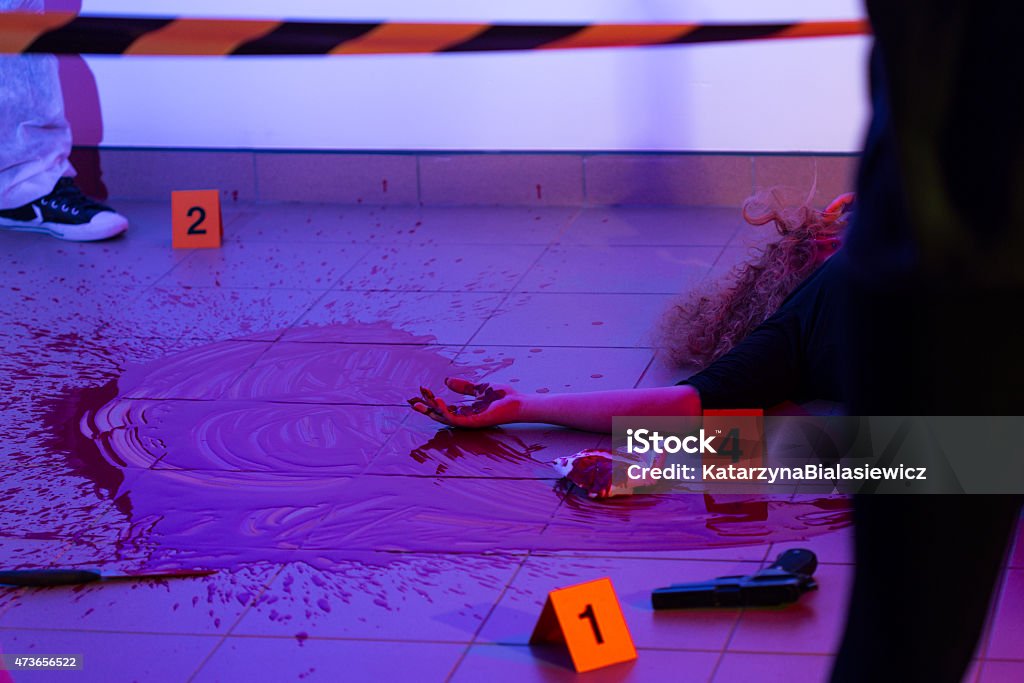 Murder scene with killed woman Picture of murder scene with killed woman Crime Scene Stock Photo