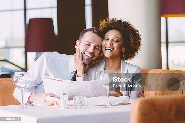 Happy Couple At Dinner In The Restaurant Stock Photo - Download Image Now - Couple - Relationship, Elegance, Dating