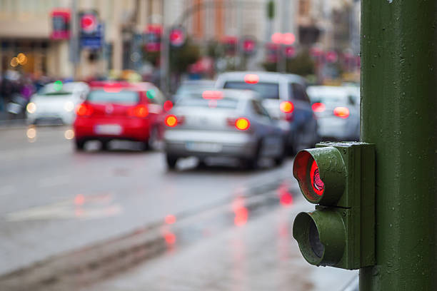 istock pedestrian lights with traffic in the background 473659198