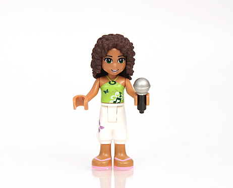 Colorado, USA - May 8, 2015: Studio shot of Lego girl singer. Legos are a popular line of plastic construction toys manufactured by The Lego Group, a company based in Denmark.