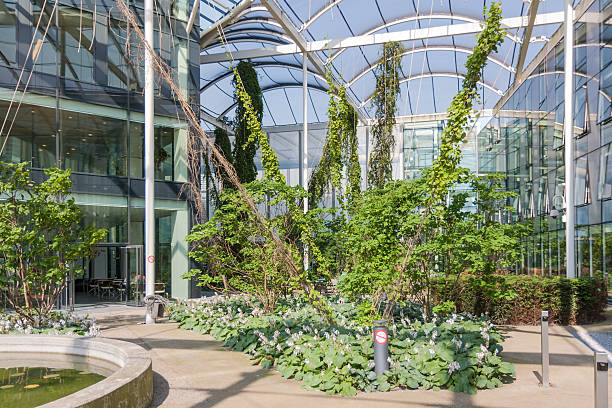istock Atrium with pool and plants in a modern building 473672206