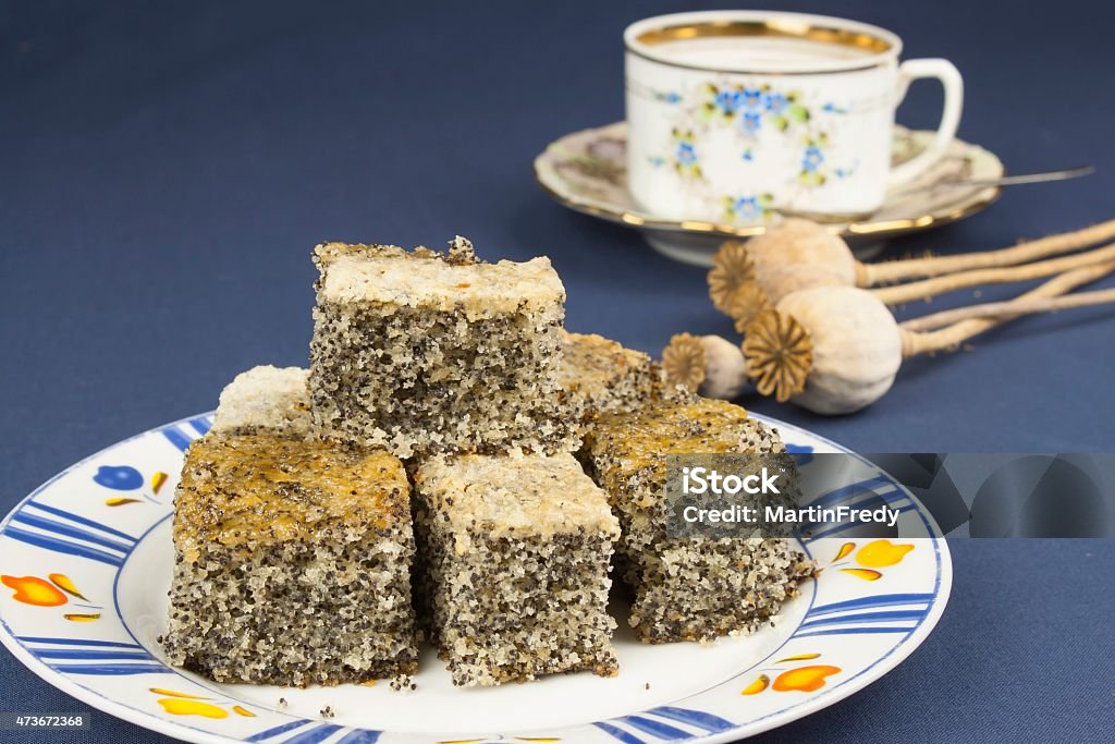 homemade poppy seed cake on a table with a tablecloth 2015 Stock Photo