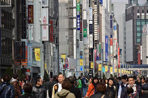 istock Ginza shopping district with crowds in Tokyo, Japan 473676320