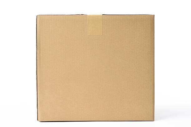 istock Isolated shot of closed cube cardboard box on white background 473676534