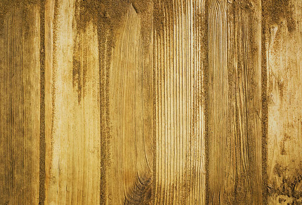 istock Sand on planked wood background - closeup. 473677016