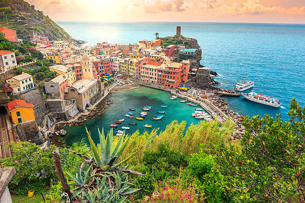 Vernazza village and stunning sunrise,Cinque Terre,Italy,Europe Panorama of Vernazza and suspended garden,Cinque Terre National Park,Liguria,Italy,Europe liguria photos stock pictures, royalty-free photos & images
