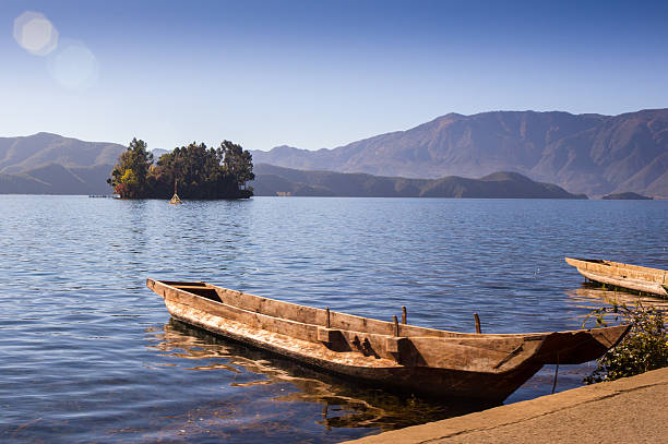 istock the boat on a beautiful lake 473678752