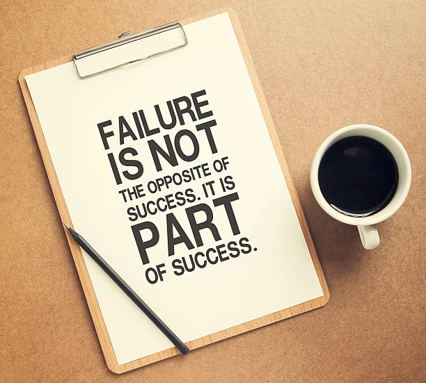 istock Inspirational motivating quote on success on clipboard 473679338