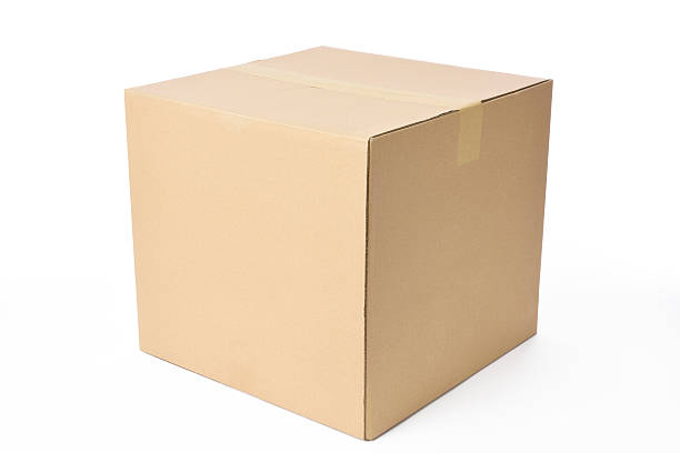 istock Isolated shot of closed cube cardboard box on white background 473681856