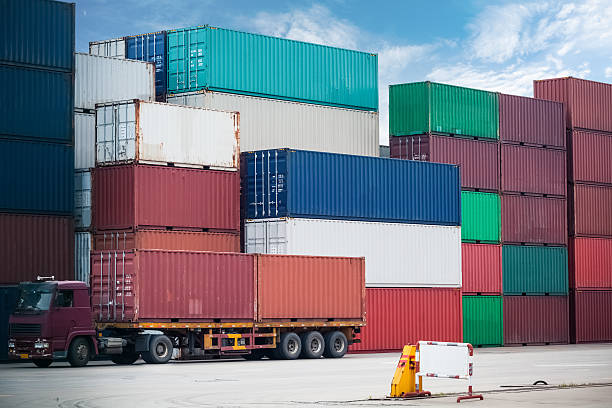 istock truck in containers storage area 473683112