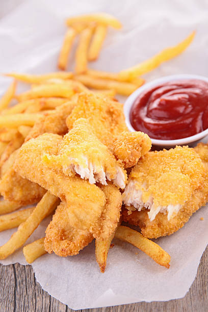istock french fries and chicken breaded fried 473684564