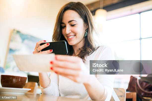 Check Remote Deposit Capture At Cafe Stock Photo - Download Image Now - Check - Financial Item, Paycheck, Bank Deposit Slip