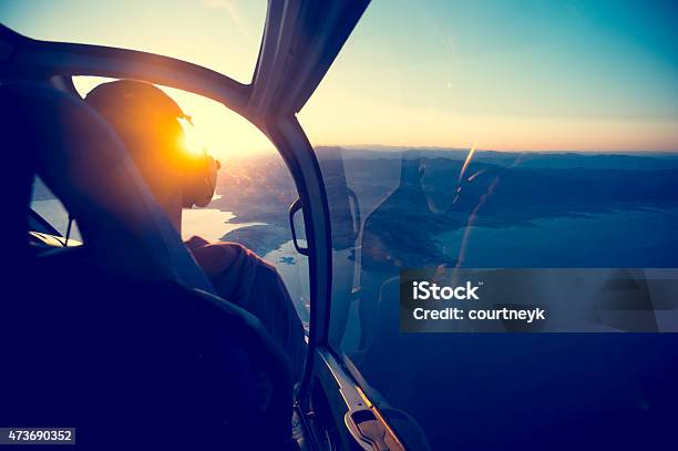 Flying In A Helicopter Over Lake Mead In Arizona Stock Photo - Download Image Now - Pilot, Piloting, Helicopter