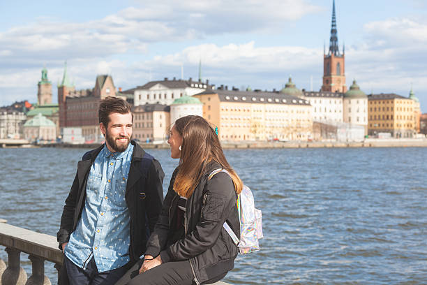 istock Young hipster couple visiting Stockholm 473695460
