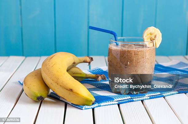 Healthy Homemade Banana Juice In Glass And Fresh Bananas On Stock Photo - Download Image Now